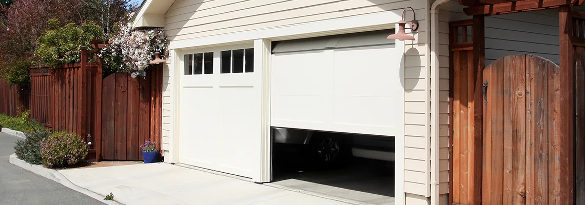 Fix Metal Garage Door Jerking in Sanford, Florida